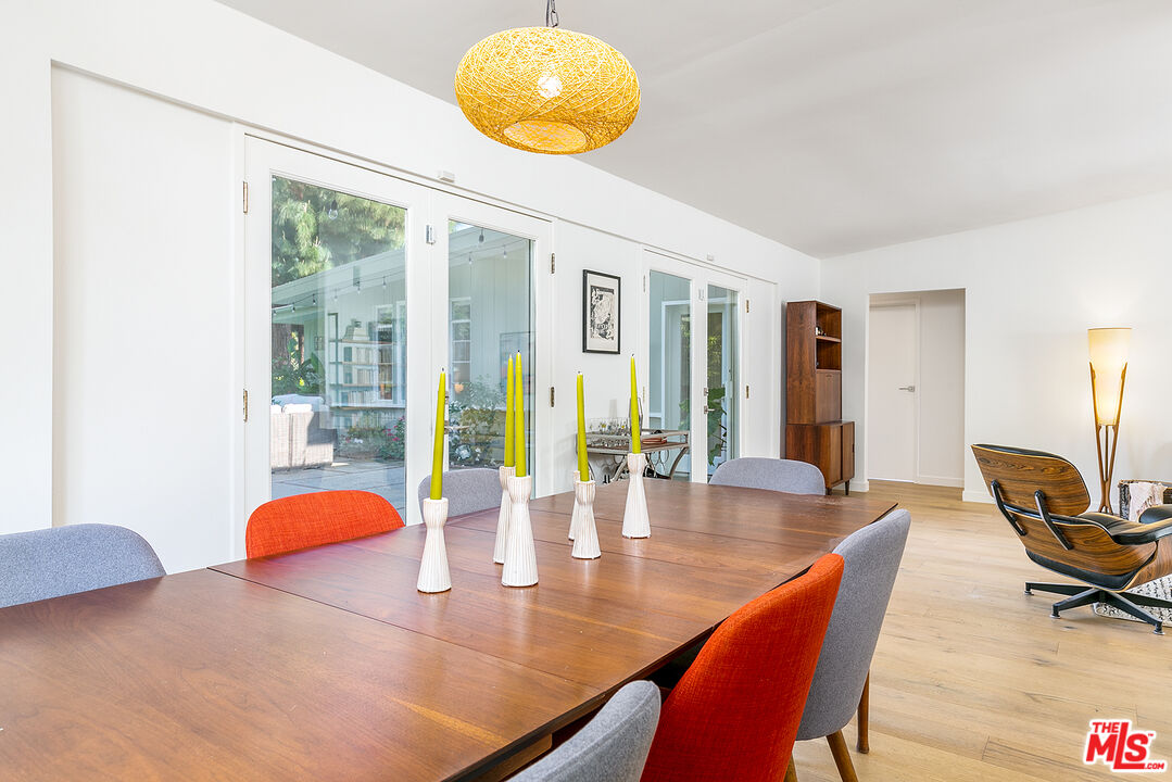 2386 Allen Avenue Altadena, CA 91001 - Photo 10 of 41 a view of a dining room with furniture and wooden floor