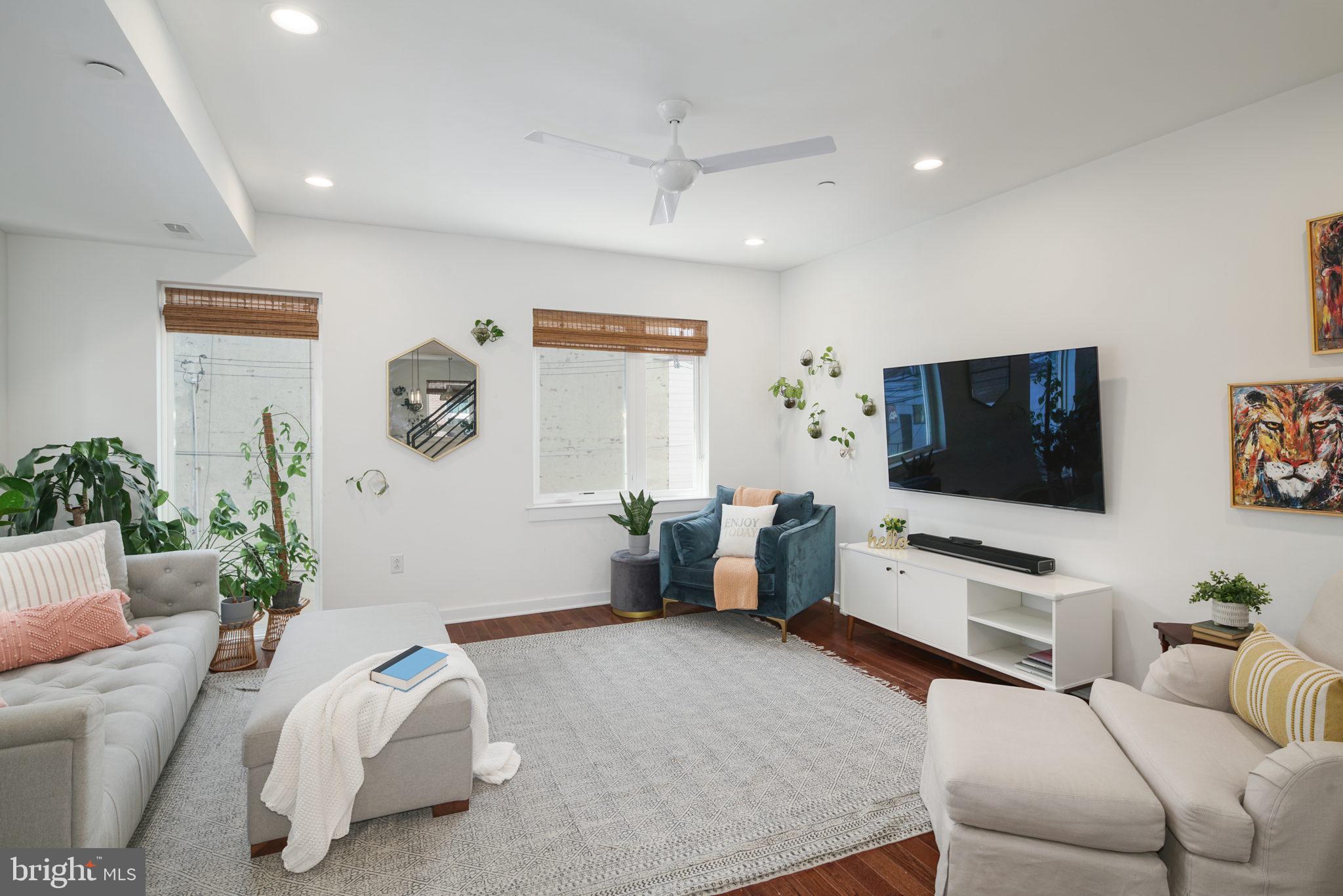 159 East Allen Street, Unit 1 Philadelphia, PA 19125 - Photo 6 of 45 a living room with furniture and a flat screen tv