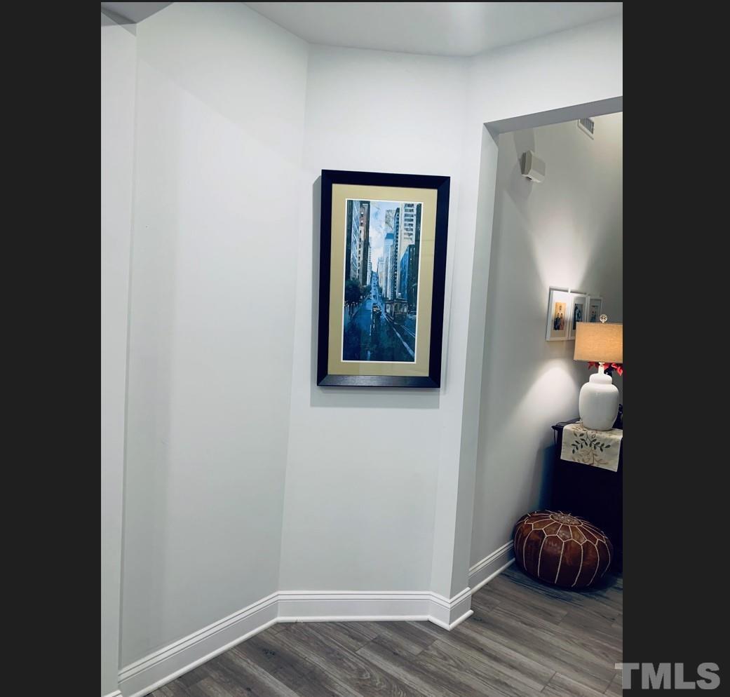 1010 Hero Place Cary, NC 27519 - Photo 5 of 14 a view of room with wooden floor and closet
