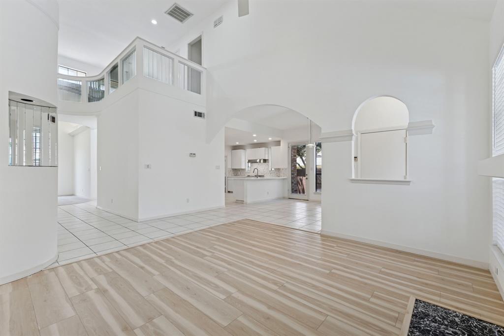 2685 Carnation Drive Richardson, TX 75082 - Photo 12 of 40 a view of empty room with wooden floor