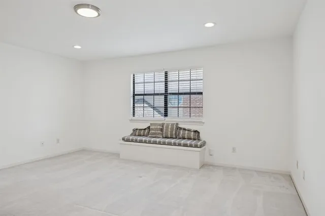 a bathroom with a sink toilet a mirror and shower
