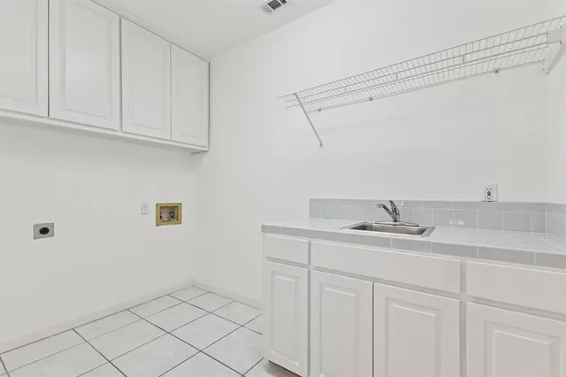 a view of a swimming pool with a yard