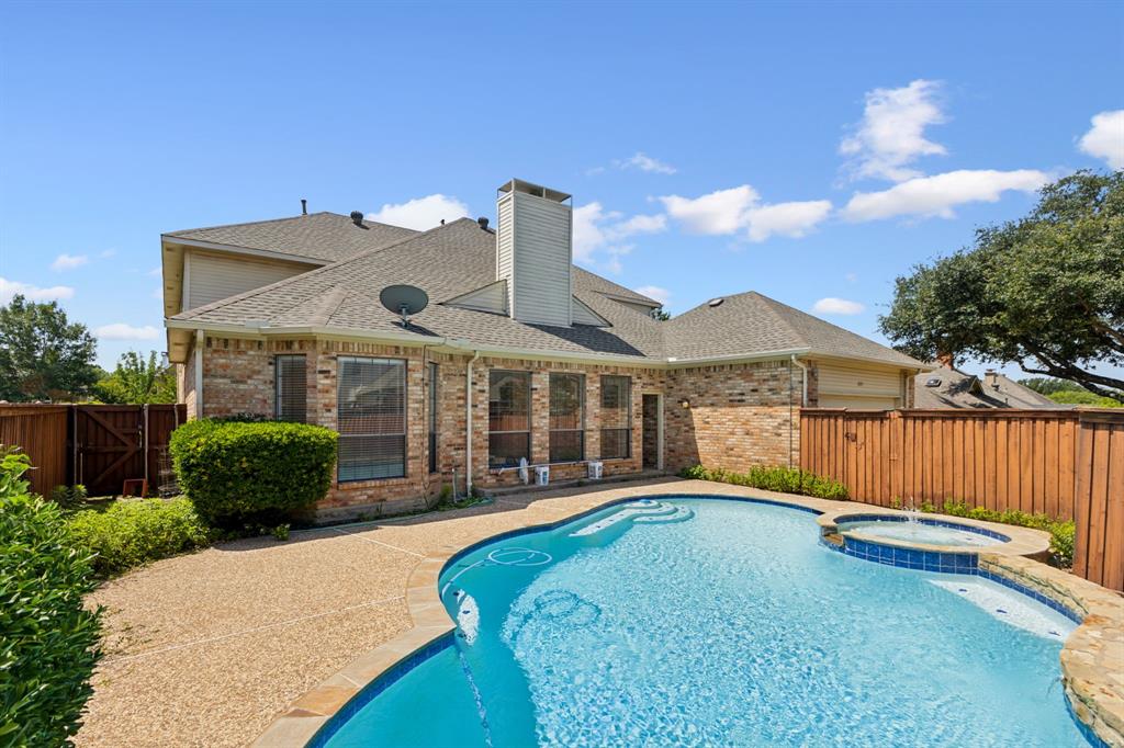 2685 Carnation Drive Richardson, TX 75082 - Photo 39 of 40 a front view of a house with a yard