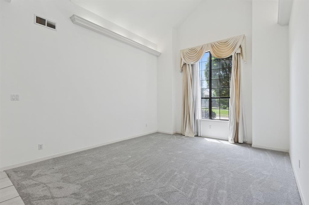 2685 Carnation Drive Richardson, TX 75082 - Photo 5 of 40 a view of an empty room with a window