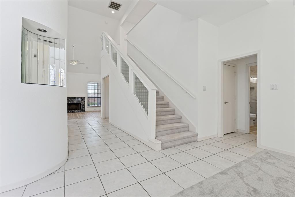 2685 Carnation Drive Richardson, TX 75082 - Photo 7 of 40 a view of a livingroom with an empty space and a stove top oven