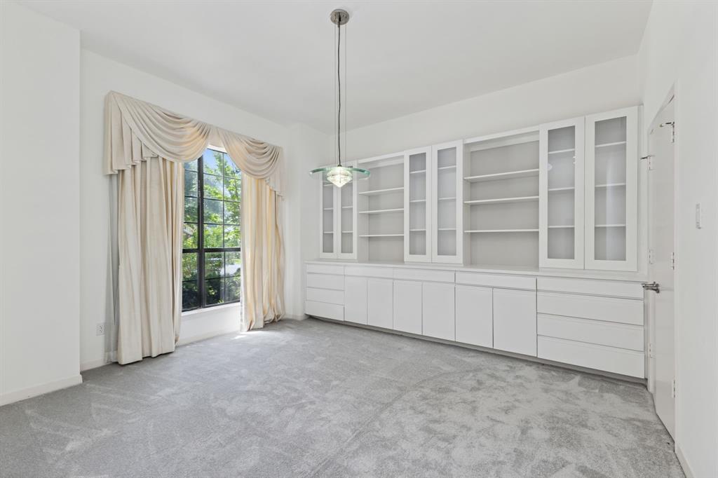 2685 Carnation Drive Richardson, TX 75082 - Photo 8 of 40 a view of an empty room with a window