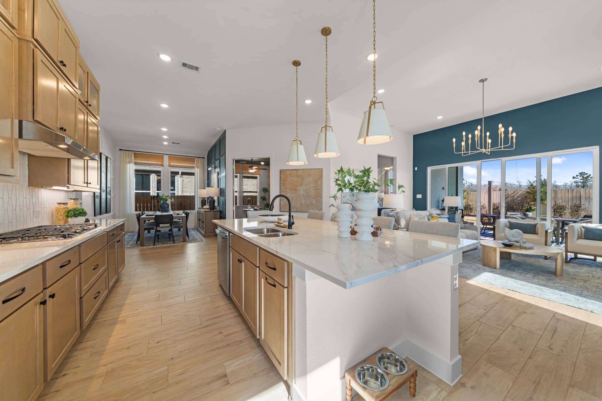 205 Purple Muhly Road Georgetown, TX 78633 - Photo 14 of 23 a large kitchen with kitchen island a large island in it