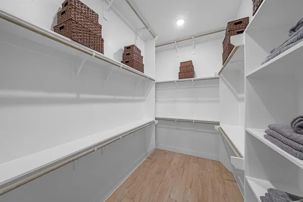 a view of an empty walk in closet