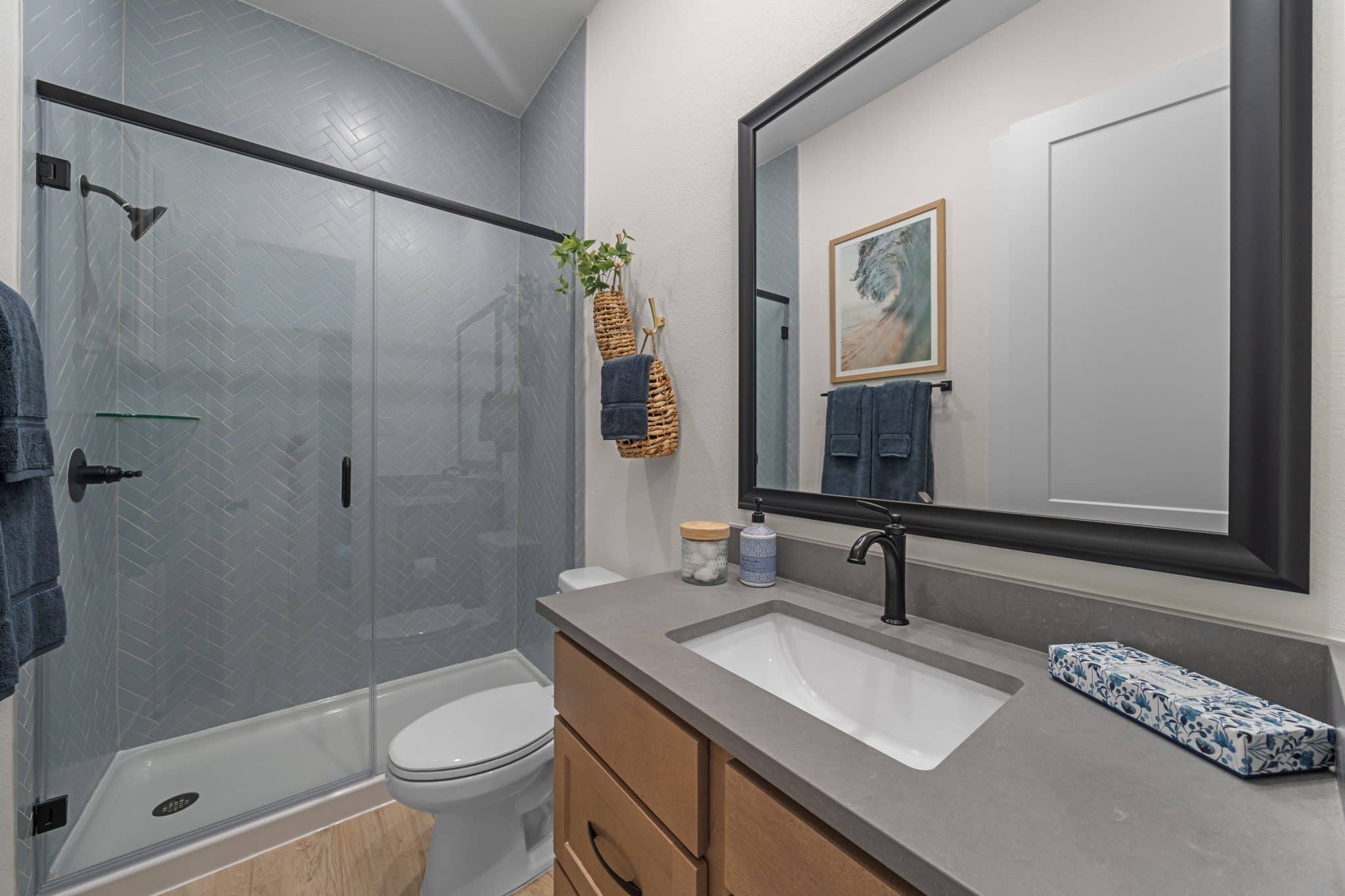 205 Purple Muhly Road Georgetown, TX 78633 - Photo 4 of 23 a bathroom with a granite countertop sink toilet and shower