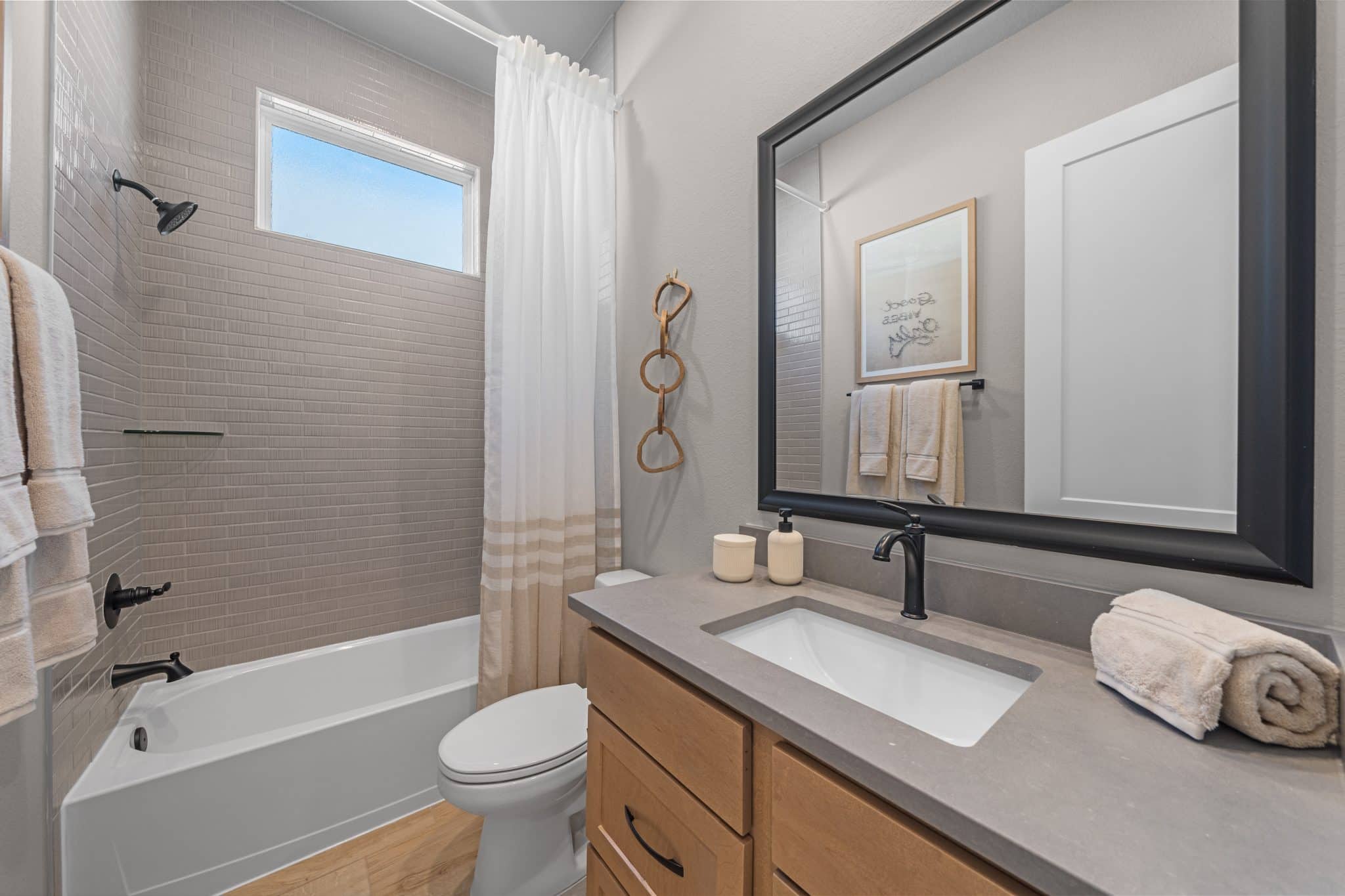 205 Purple Muhly Road Georgetown, TX 78633 - Photo 6 of 23 a bathroom with a granite countertop sink toilet a mirror and shower