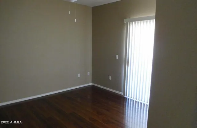 an empty room and wooden floor