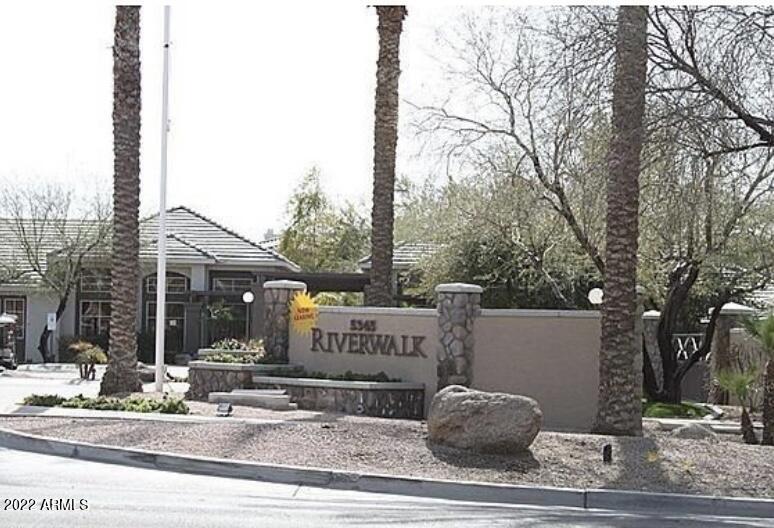 5345 East Van Buren Street, Unit 238 Phoenix, AZ 85008 - Photo 2 of 25 a view of a house with a yard and pathway
