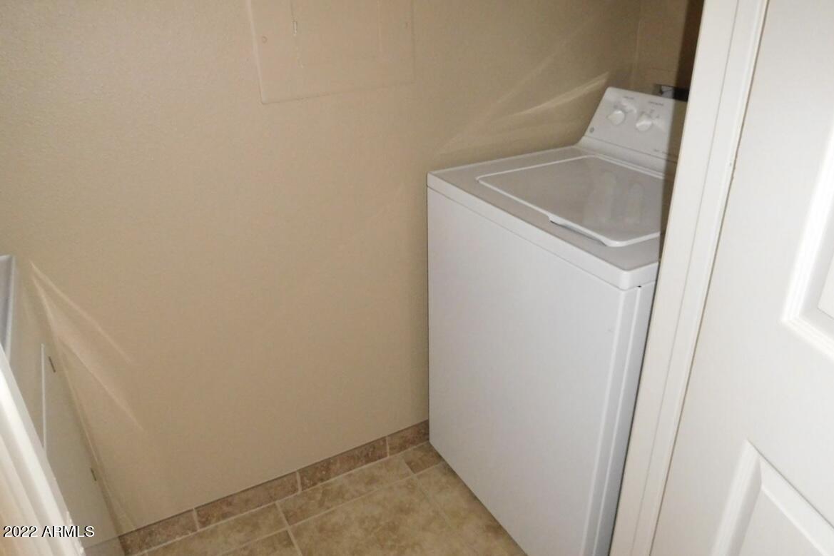 5345 East Van Buren Street, Unit 238 Phoenix, AZ 85008 - Photo 23 of 25 a utility room with dryer and washer
