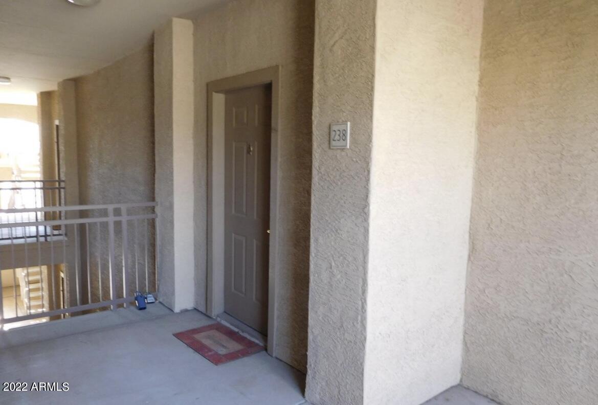 5345 East Van Buren Street, Unit 238 Phoenix, AZ 85008 - Photo 9 of 25 a view of an empty room with windows