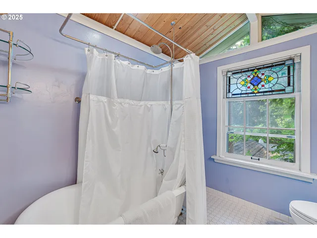 a view of a door and a window