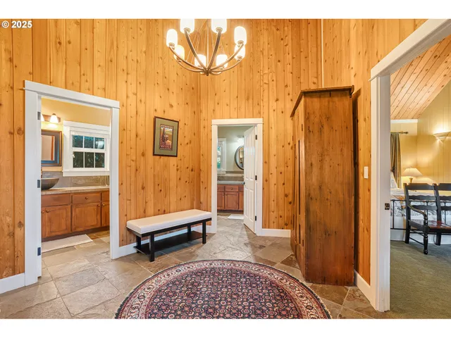 a living room with a couch and a table with wooden floor