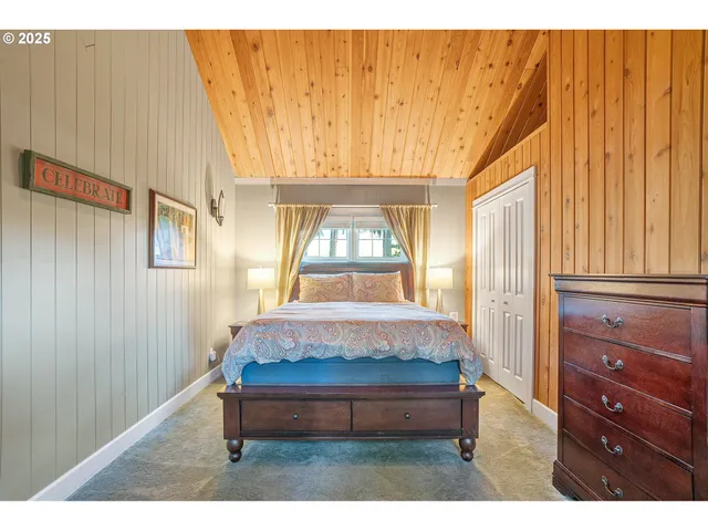 a room with a bed and window