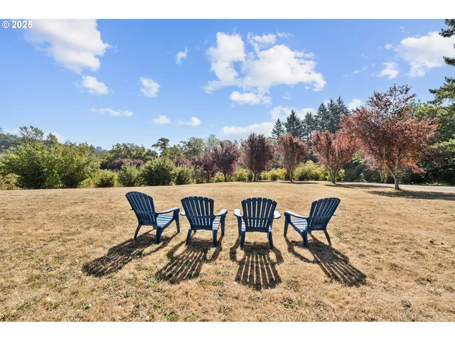 a view of a outdoor space with table and chairs