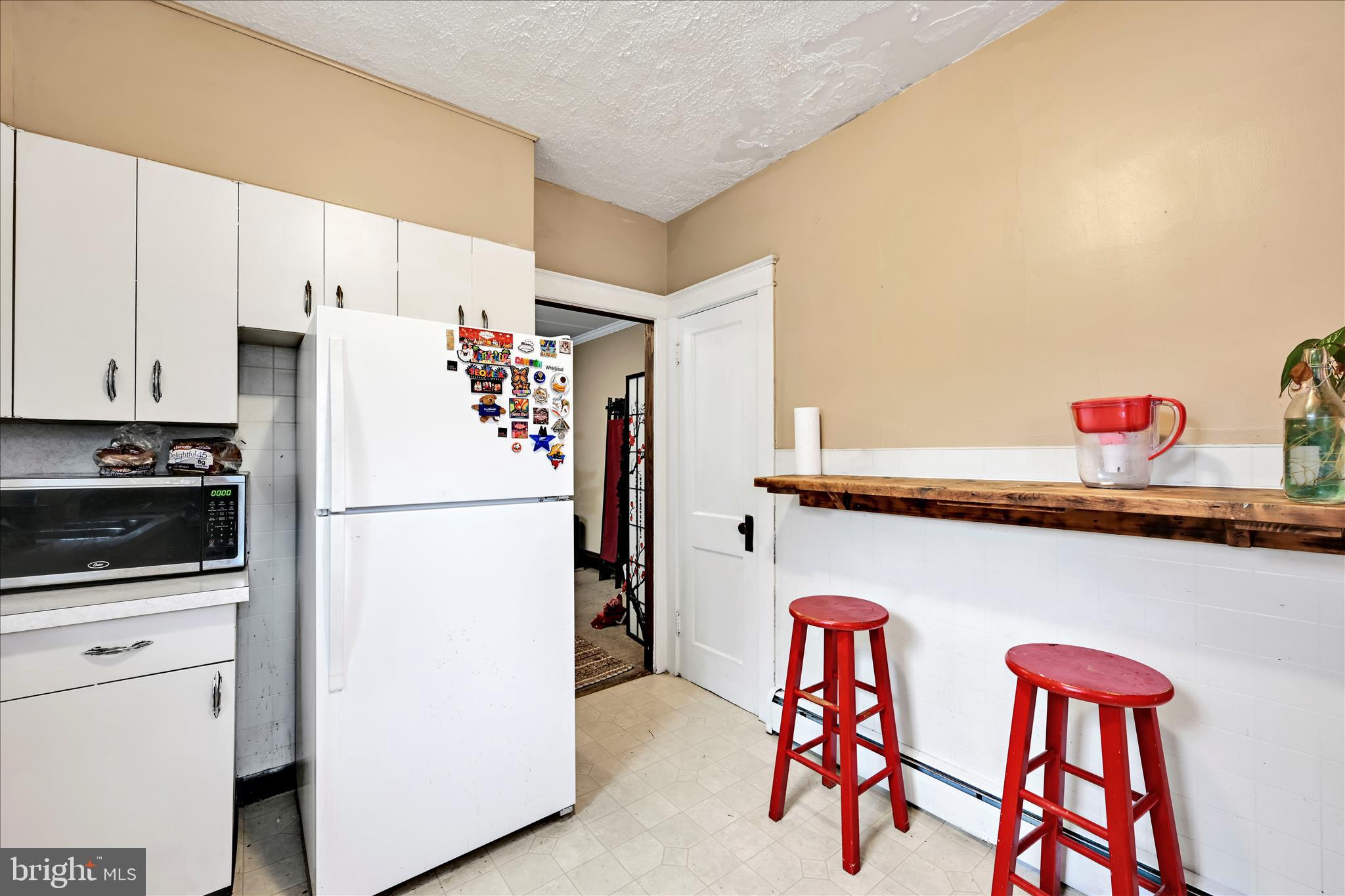 544 Spruce Street Steelton, PA 17113 - Photo 19 of 33 a white refrigerator freezer sitting in a kitchen