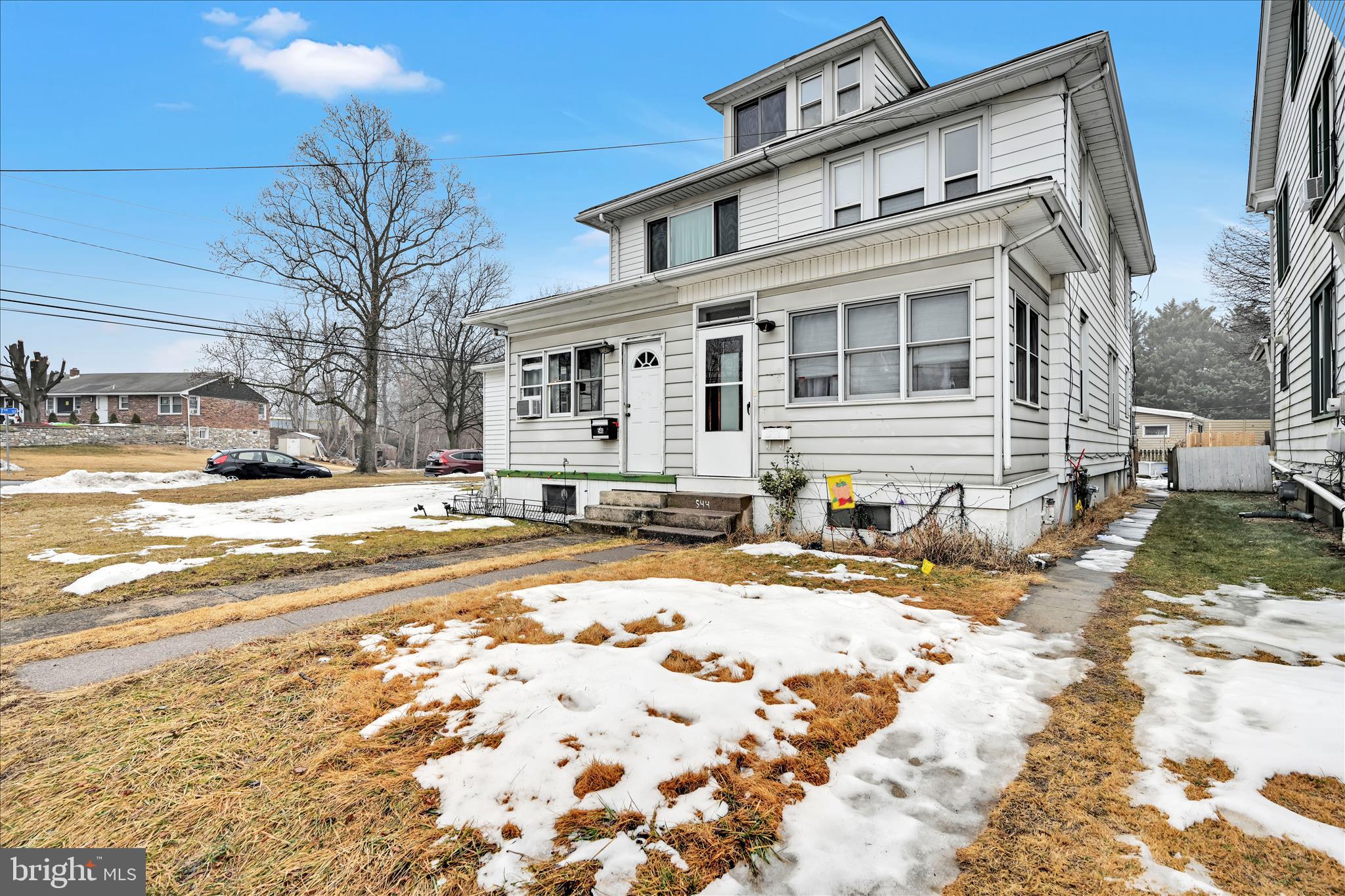 544 Spruce Street Steelton, PA 17113 - Photo 2 of 33 a view of a house with snow on the road