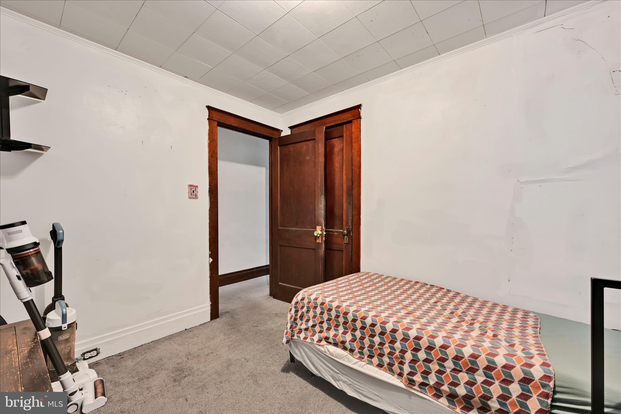 544 Spruce Street Steelton, PA 17113 - Photo 23 of 33 a bedroom with a bed and a window