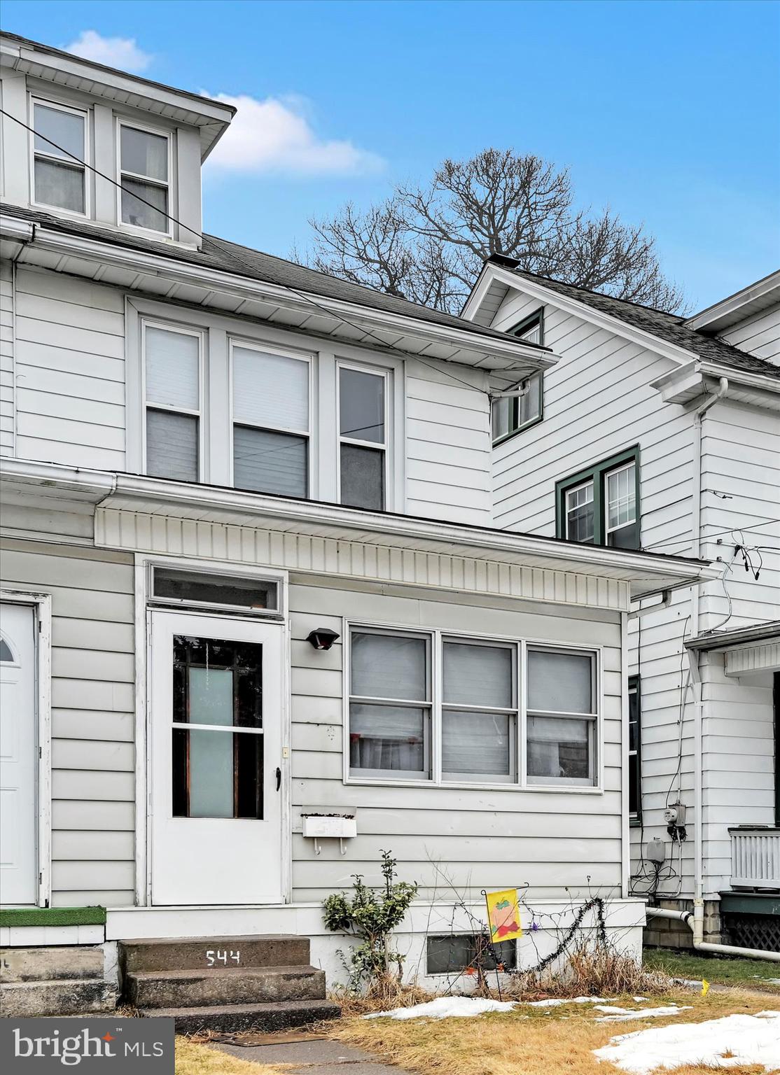 544 Spruce Street Steelton, PA 17113 - Photo 9 of 33 a view of a white house with large windows