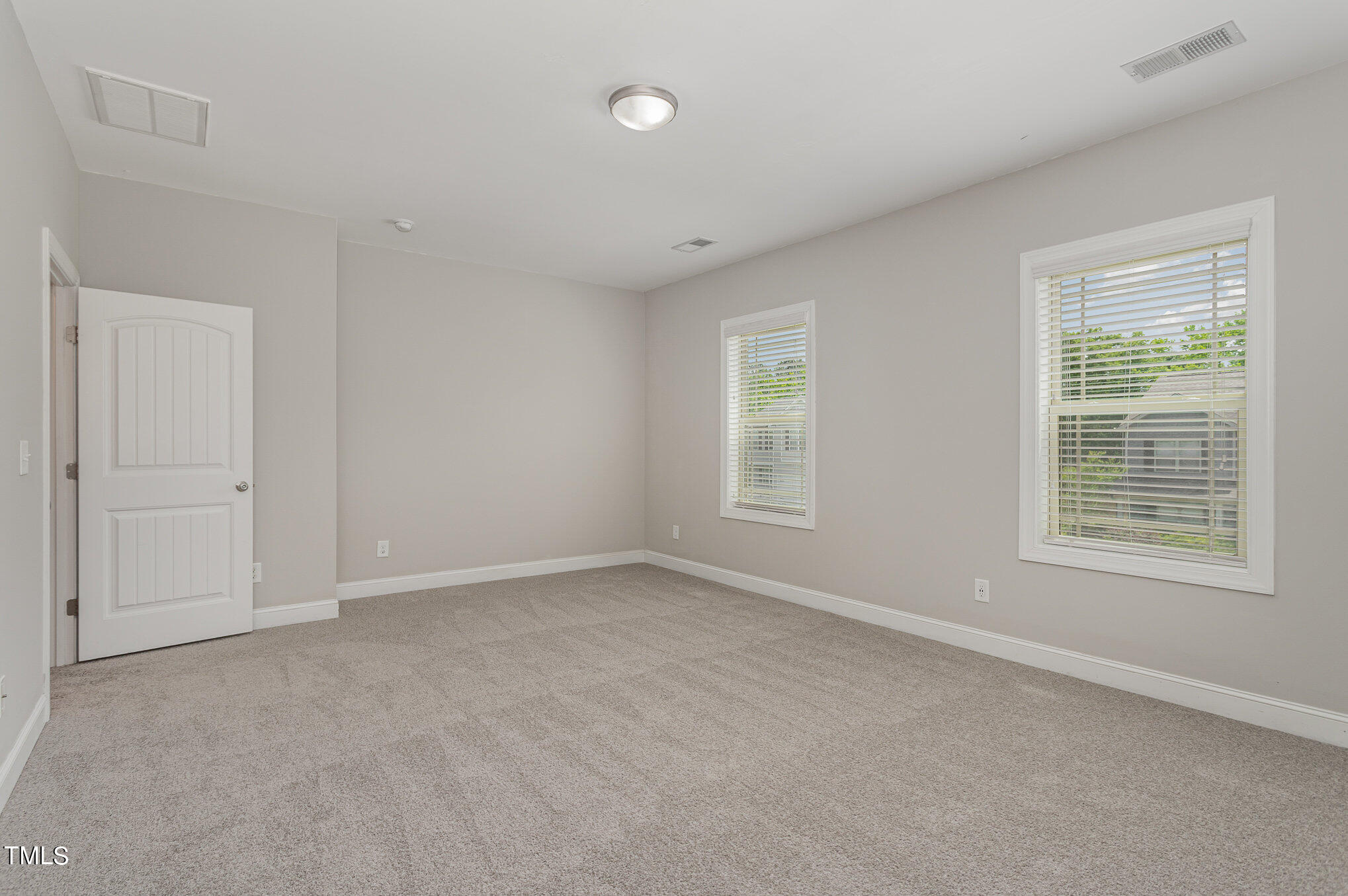 1021 Silver Farm Road Raleigh, NC 27603 - Photo 34 of 42 an empty room with a window