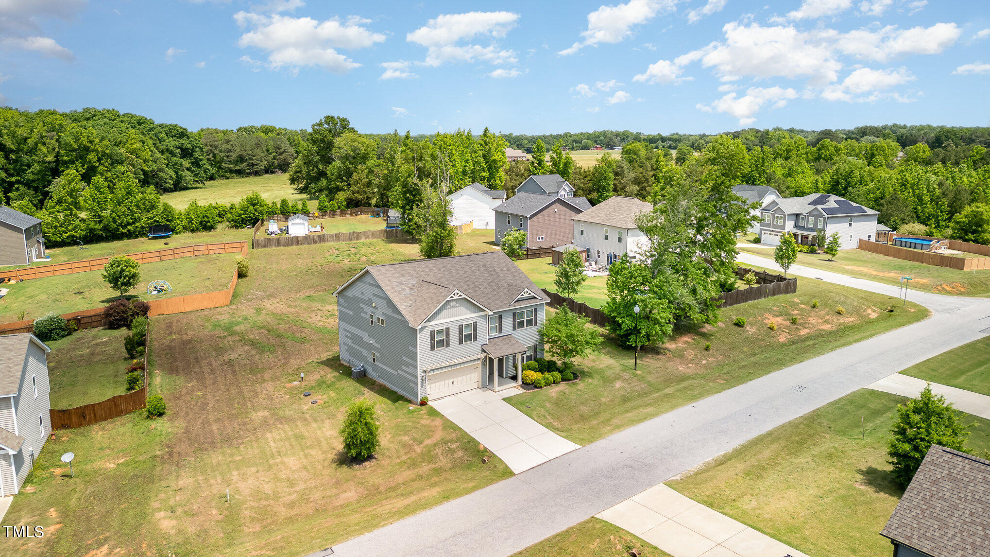 1021 Silver Farm Road Raleigh, NC 27603 - Photo 40 of 42 an aerial view of a house with yard swimming pool and outdoor seating