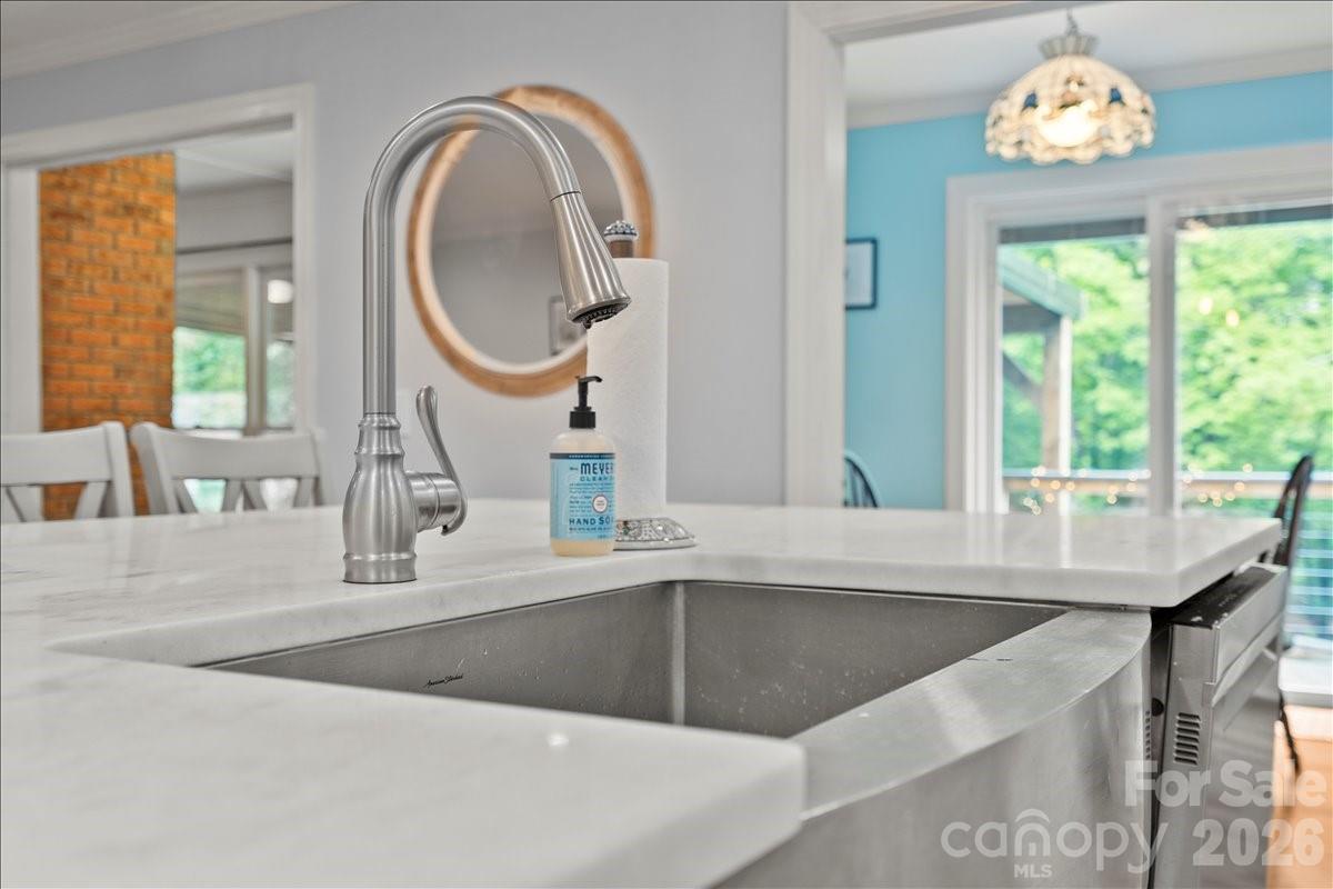 209 Fairway Road Cheraw, SC 29520 - Photo 10 of 48 a view of a kitchen with a sink and a large window