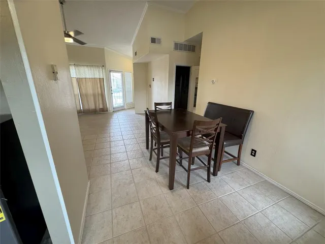 a view of a livingroom with furniture and window