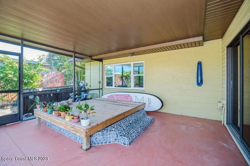 1091 Bali Road Cocoa Beach, FL 32931 - Photo 24 of 40 Covered porch