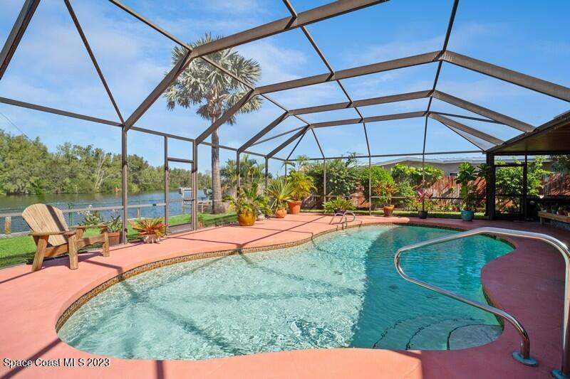 1091 Bali Road Cocoa Beach, FL 32931 - Photo 25 of 40 Screened pool