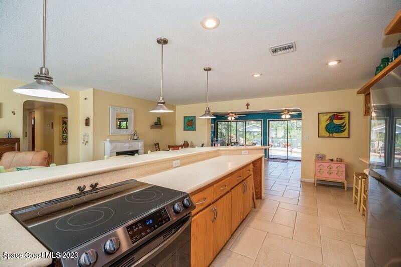 1091 Bali Road Cocoa Beach, FL 32931 - Photo 9 of 40 Open Kitchen