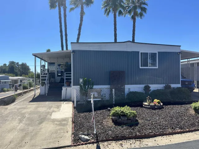a front view of a house with patio