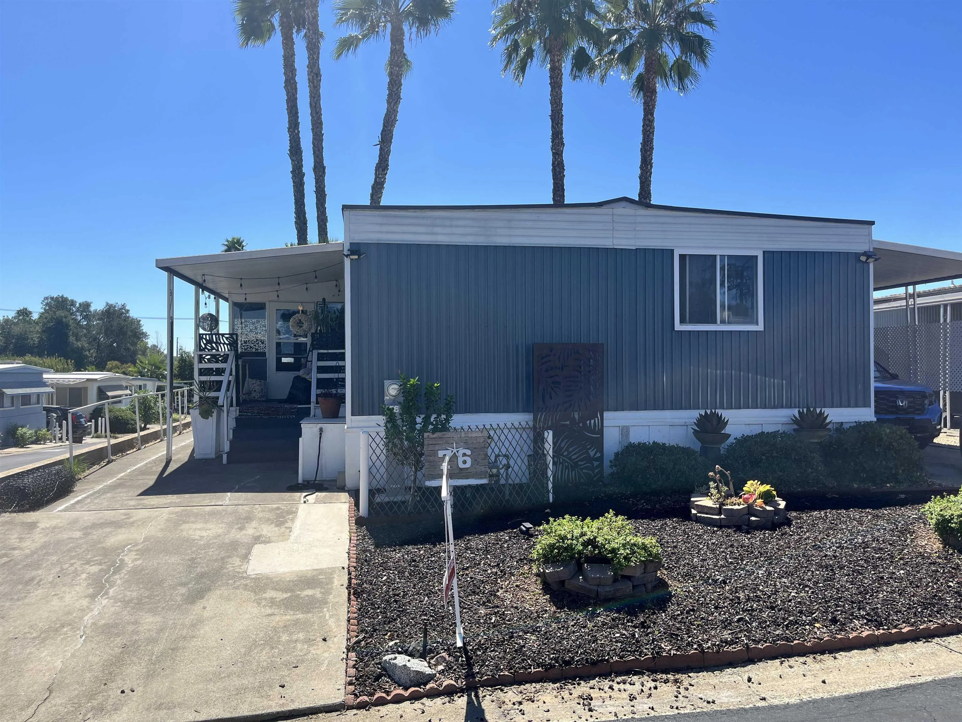 a front view of a house with patio