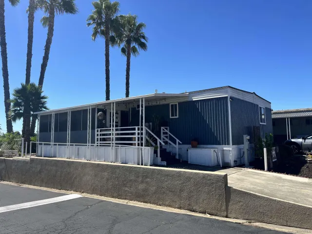 a house view with a garden space