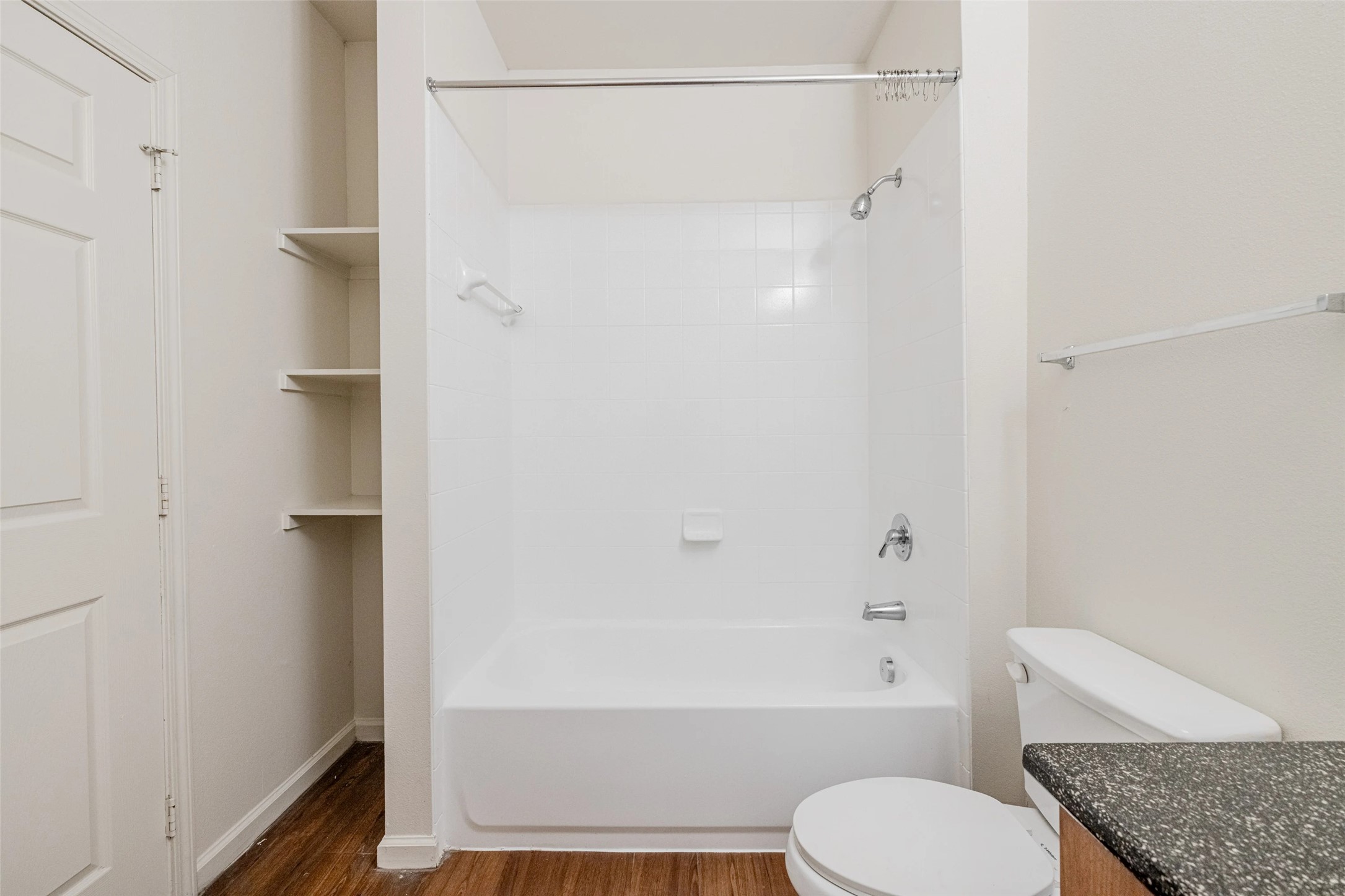 5605 Springdale Road, Unit 444411 Austin, TX 78723 - Photo 9 of 27 Up to 8 weeks free rent and waiving the standard deposit with approved credit and landlord verification.n, and dark wood-style floors