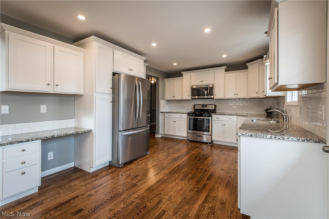 2194 Springfield Center Road Akron, OH 44312 - Photo 10 of 26 Stainless steel appliances and work station in the kitchen
