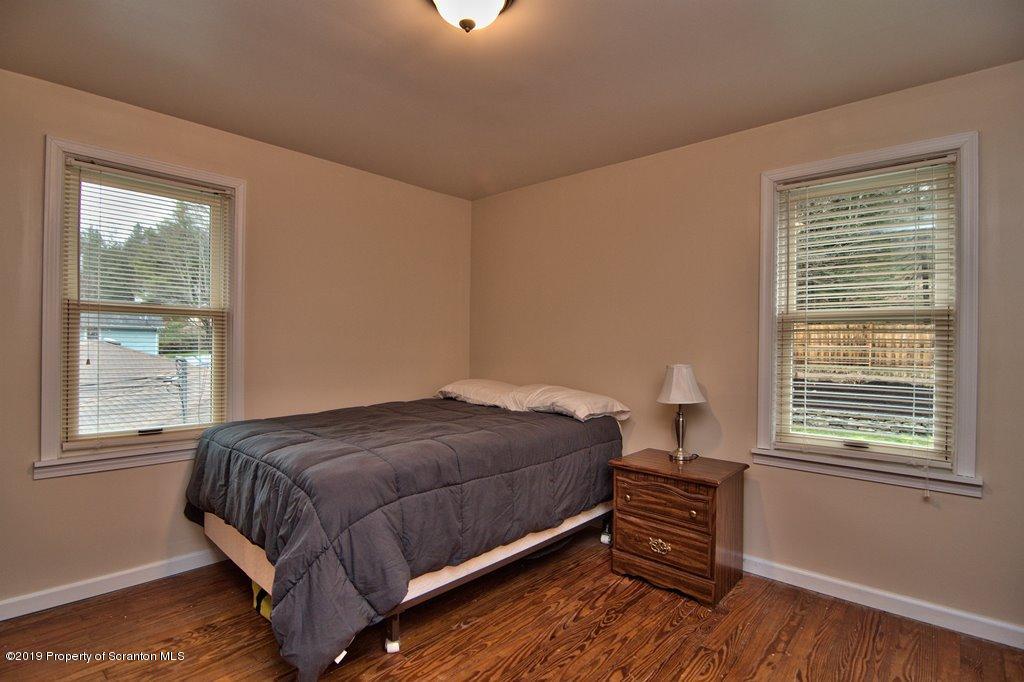 1428 Hillside Road Shavertown, PA 18708 - Photo 11 of 19 a bedroom with a bed and window