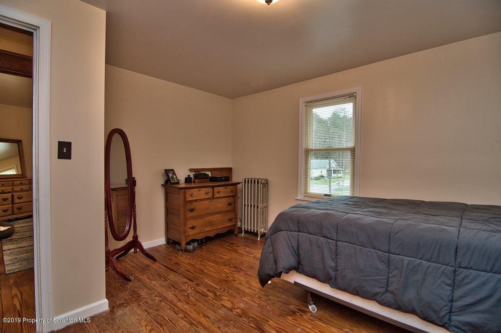 1428 Hillside Road Shavertown, PA 18708 - Photo 12 of 19 a bedroom with a bed and a dresser