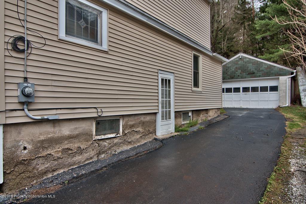 1428 Hillside Road Shavertown, PA 18708 - Photo 17 of 19 a front view of a house with a garage