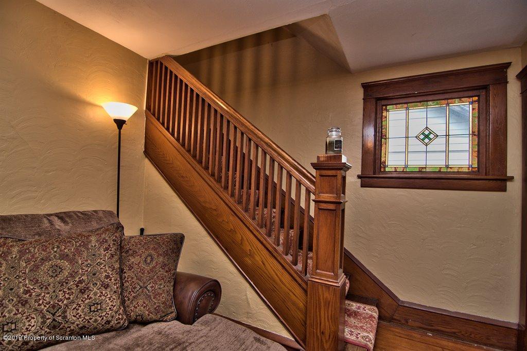 1428 Hillside Road Shavertown, PA 18708 - Photo 7 of 19 a view of entryway and hall with wooden floor