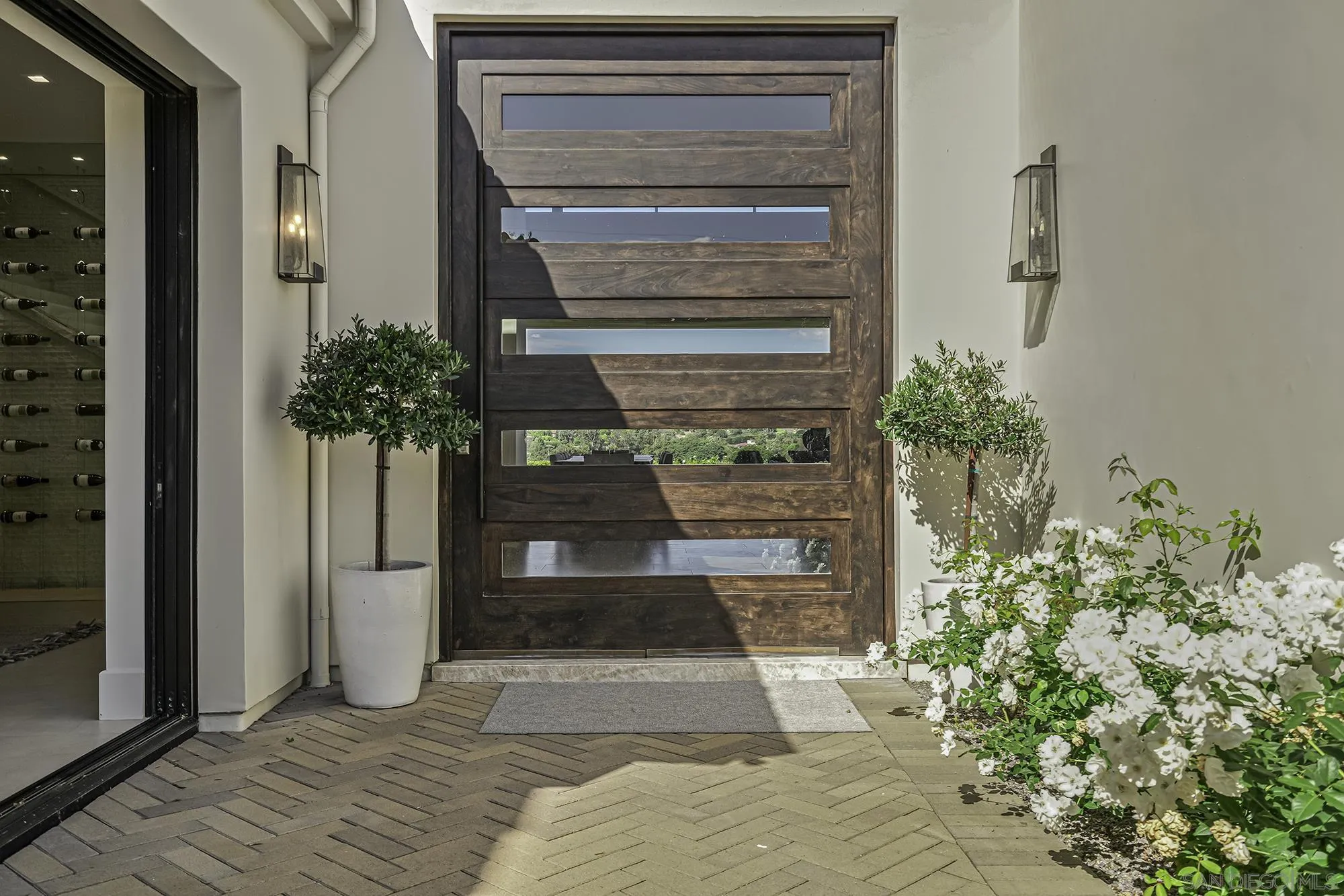 5516 La Crescenta Road Rancho Santa Fe, CA 92067 - Photo 10 of 49 a view of a entryway door of house
