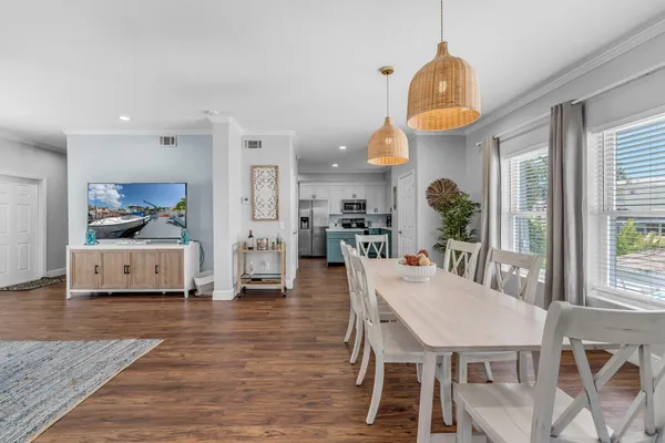 a kitchen with a refrigerator sink and microwave