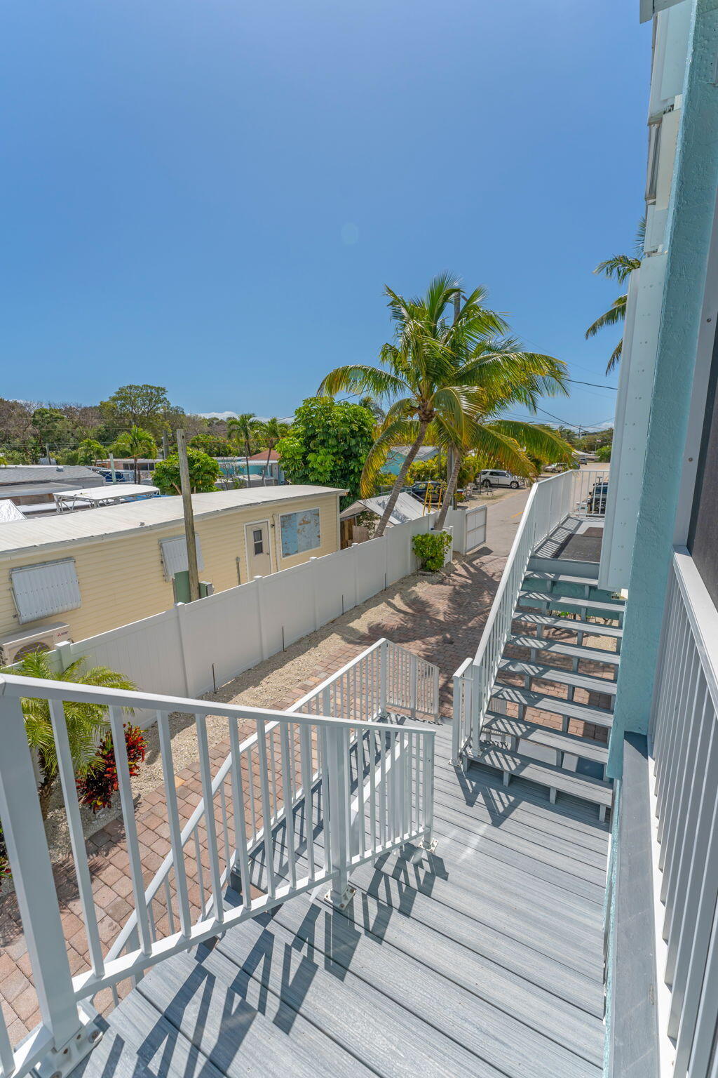 20 Pelican Road Key Largo, FL 33037 - Photo 36 of 54 Dual stairs from terrace and entrance