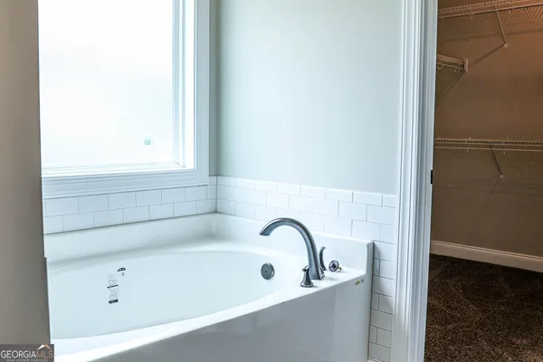 a bathroom with a bathtub