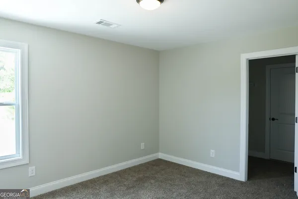 an empty room with a window