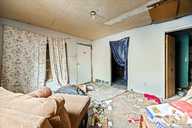 a view of a workspace with furniture