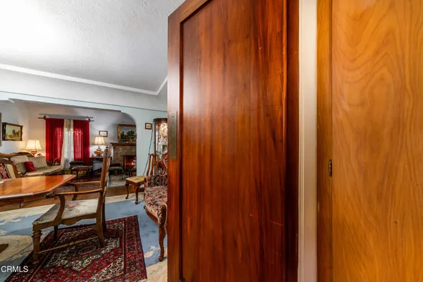a kitchen with stainless steel appliances a sink dishwasher a stove and a refrigerator
