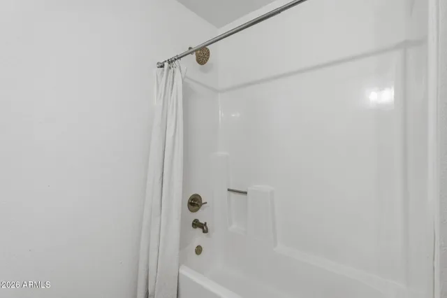 a bathroom with a bathtub